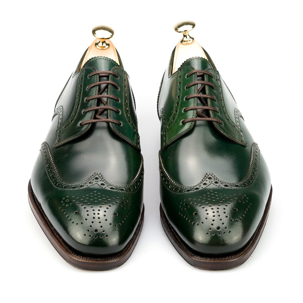 green wingtip shoes